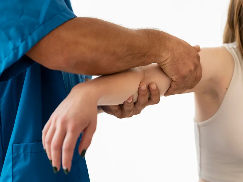 Chiropractic care for elbow pain at Bluebonnet Chiropractic in Denver